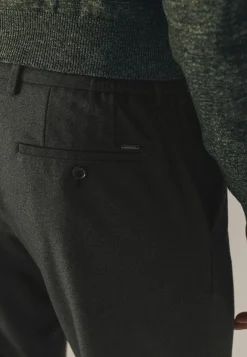 Gemêleerde chino in stretchstof