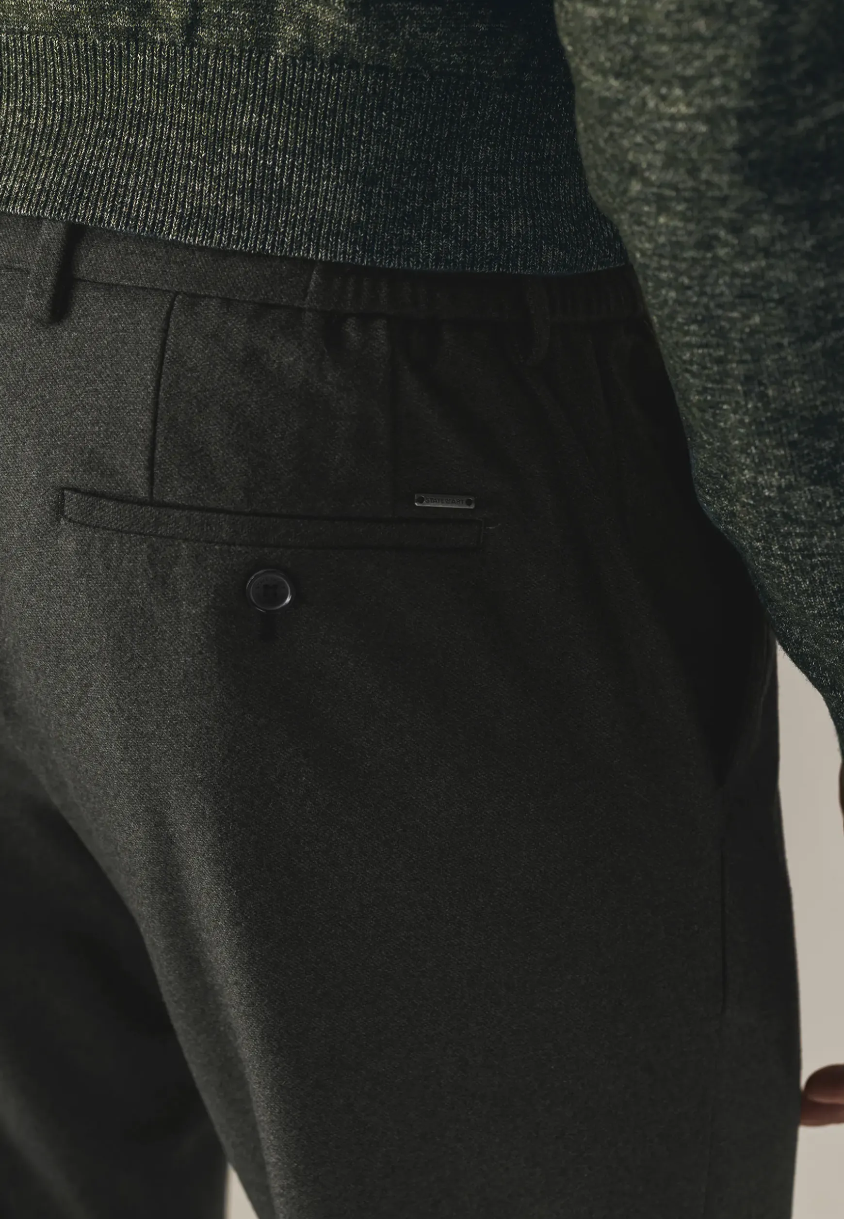 Gemêleerde chino in stretchstof