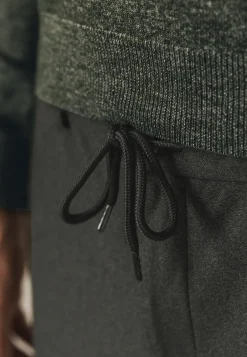 Gemêleerde chino in stretchstof