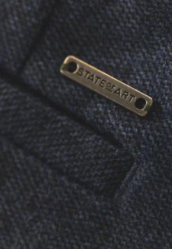 Gemêleerde chino in stretchstof
