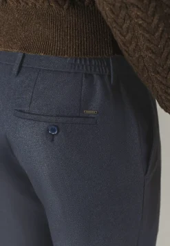 Gemêleerde chino in stretchstof