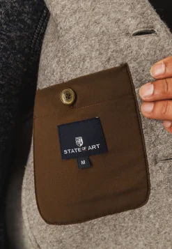 Jas met klep- en steekzakken