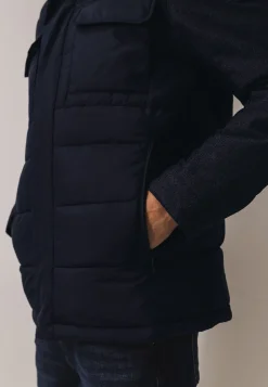 Jas met visgraatmouwen