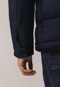 Jas met visgraatmouwen
