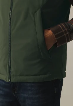 Omkeerbare bodywarmer met hoge kraag
