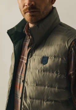 Omkeerbare bodywarmer met hoge kraag
