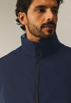 Omkeerbare bodywarmer met hoge kraag