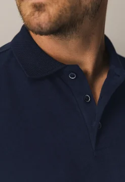 Polo met structuurgebreide kraag