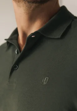 Polo met structuurgebreide kraag
